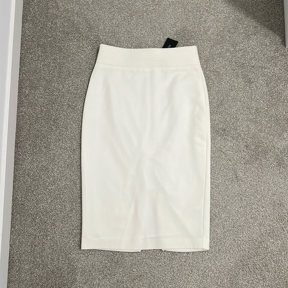 Marciano ivory white pencil skirt with a gold zipper on the back. - Picture 1 of 4
